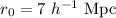 Mathematical equation: $r_0=7~h^{-1}~{\rm Mpc}$