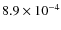 $8.9 \times 10^{-4}$