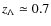 $z_{\Lambda} \simeq 0.7$
