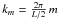 Mathematical equation: \hbox{$k_m = {2\pi \over L/2} \,m$}