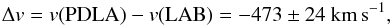 Mathematical equation: \begin{eqnarray*} \Delta v = v({\rm PDLA})-v({\rm LAB})=-473\pm 24~\mathrm{km\,s}^{-1}\mathrm{,} \end{eqnarray*}