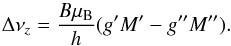 \begin{equation} \Delta\nu_z=\frac{B\mu_\text{B}}{h}(g^\prime M^\prime-g^{\prime\prime} M^{\prime\prime}).\label{eq:Zeeman_split} \end{equation}